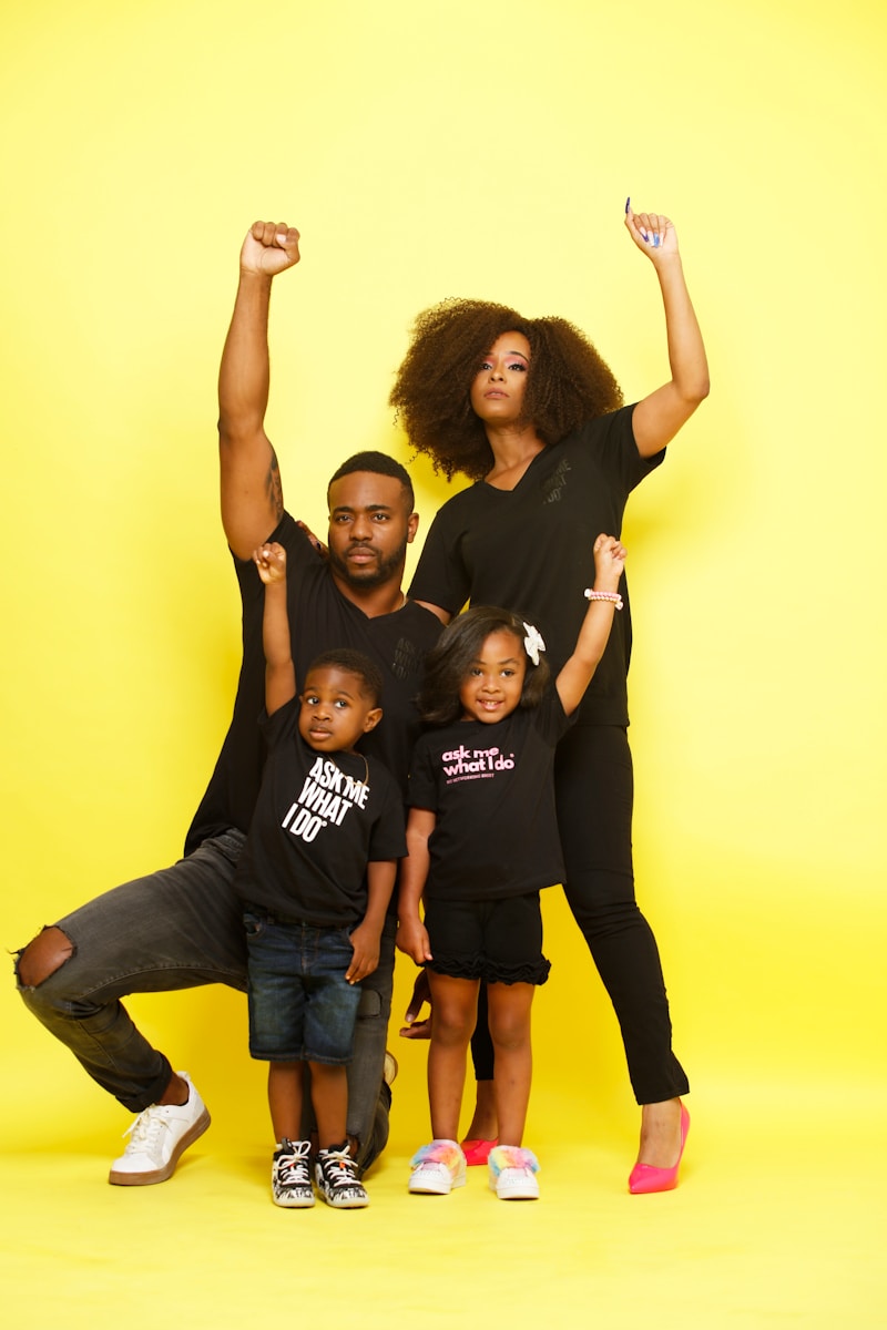 3 women in black t-shirt and blue denim jeans